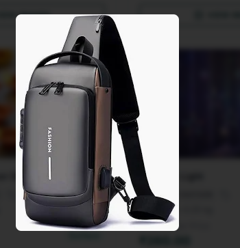 Black and grey anti-theft cross body bag with USB charging port